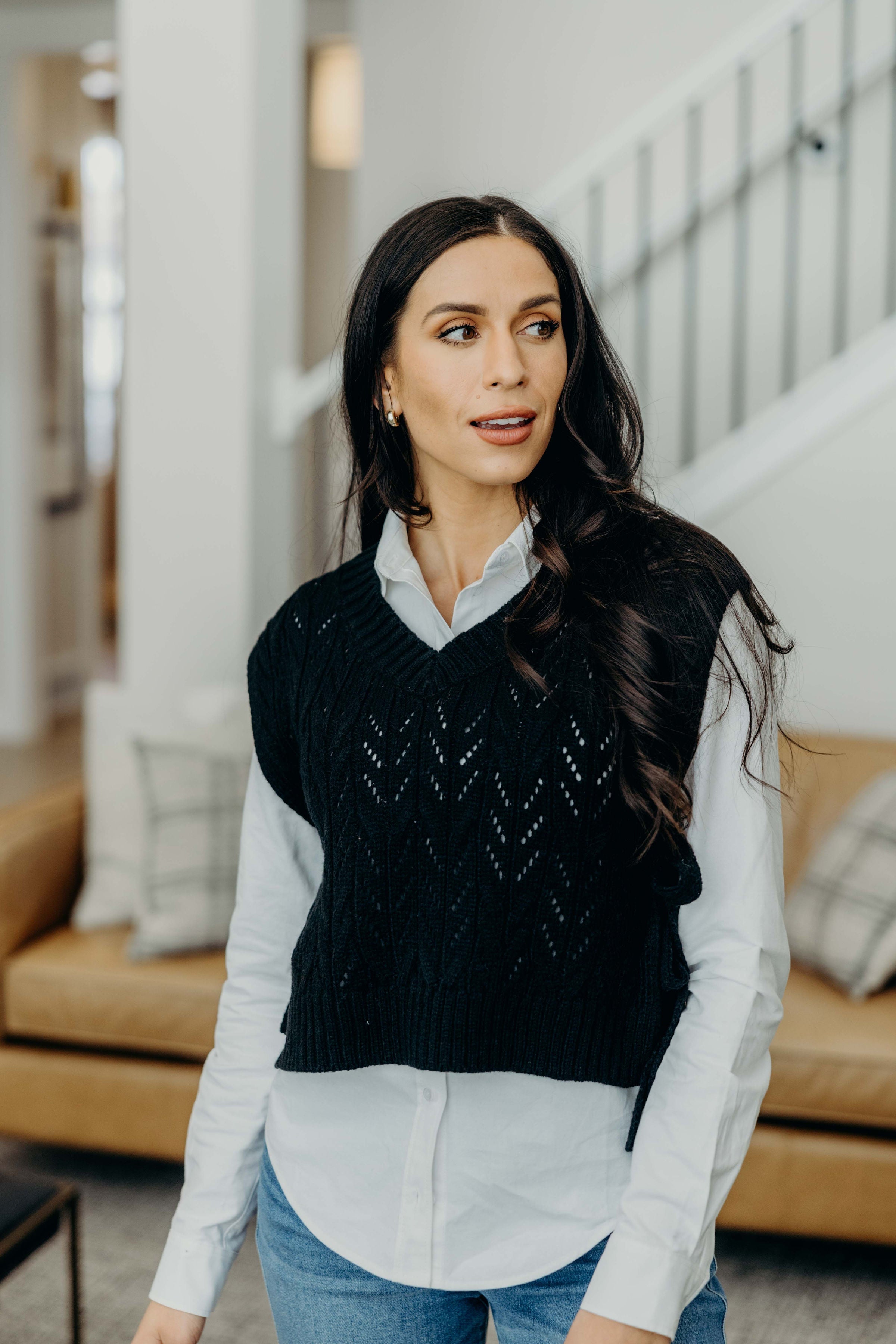 CABLE KNIT SWEATER VEST IN BLACK